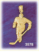 14K Gold Hockey Player Skating W/Puck Charm
