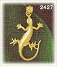 14k gold long tailed lizard charm